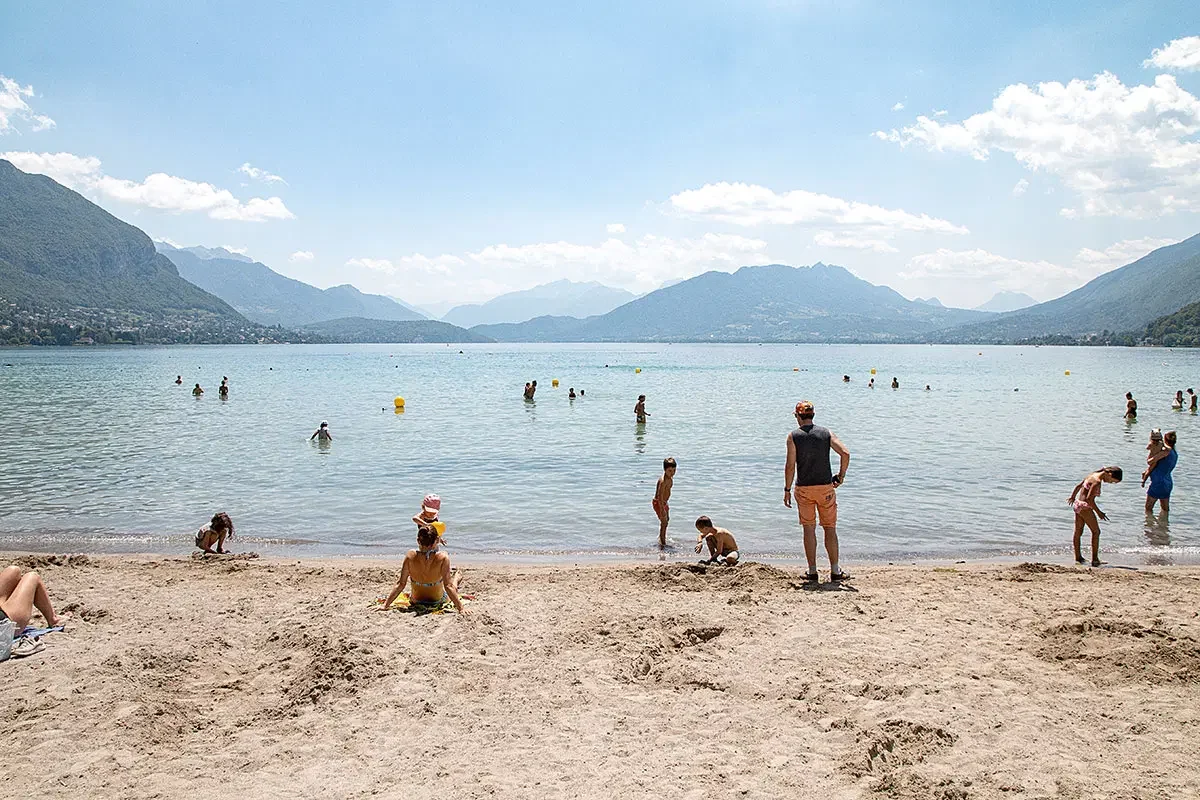 Beach and swimmers on Lake Annecy